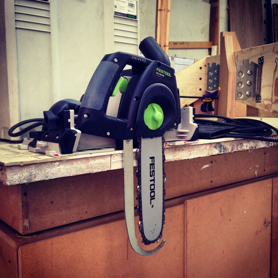 A Festool rail chainsaw for preparing the Kerto angled joist cuts in the workshop..