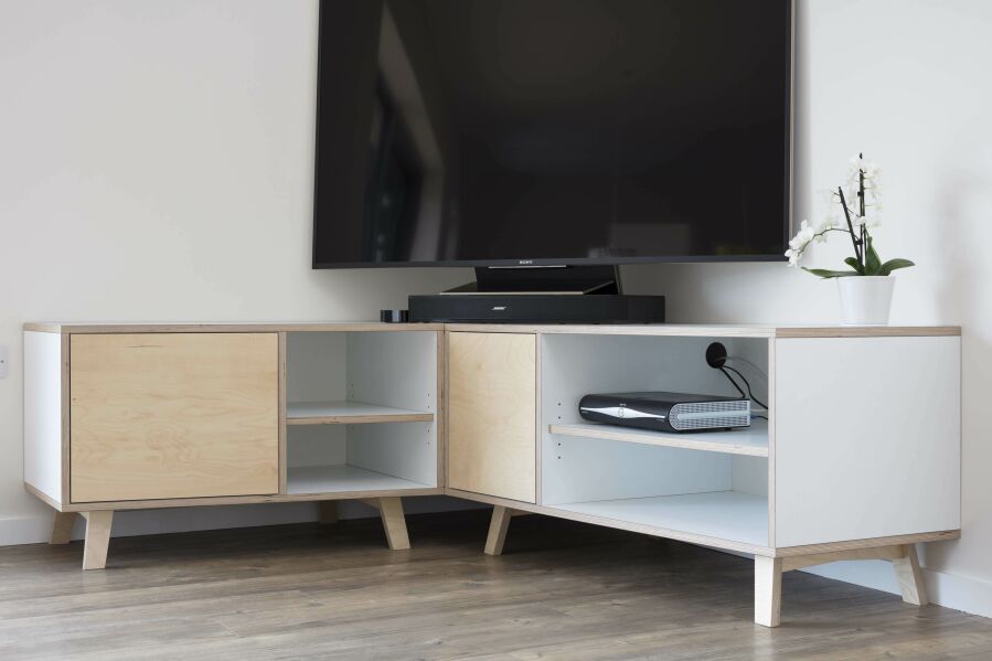 Modern corner audio and video unit made from laminated birch plywood..